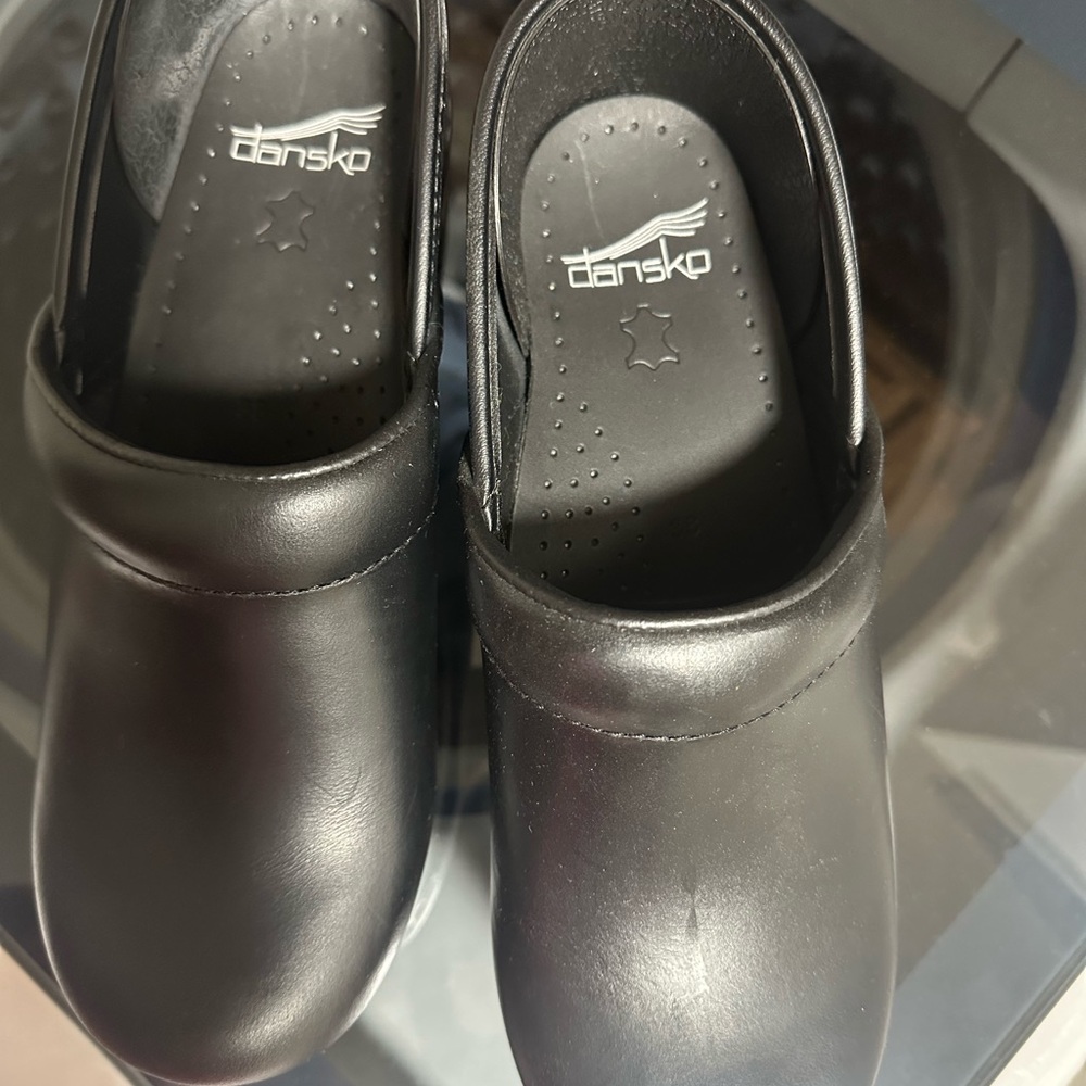 Dansko Sleek Black Leather Clogs